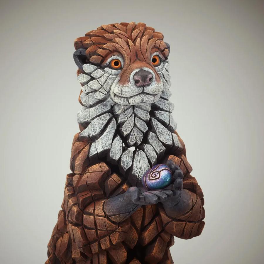Otter Sculpture With Pebbles